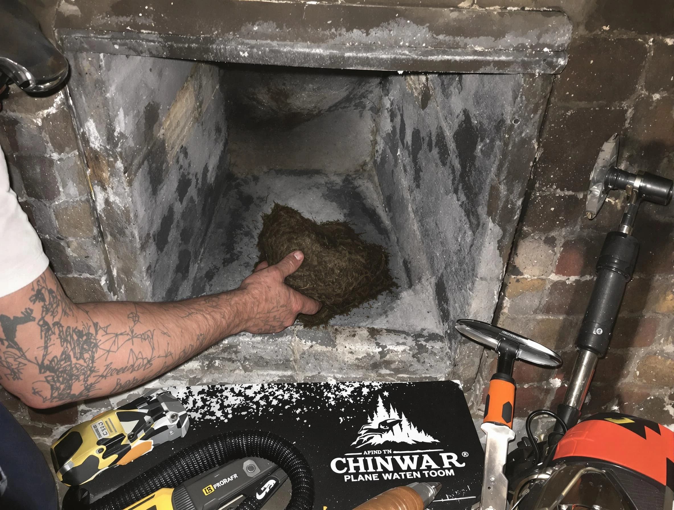 Roselle Chimney Sweep safely removing debris and screening chimney in Roselle, NJ